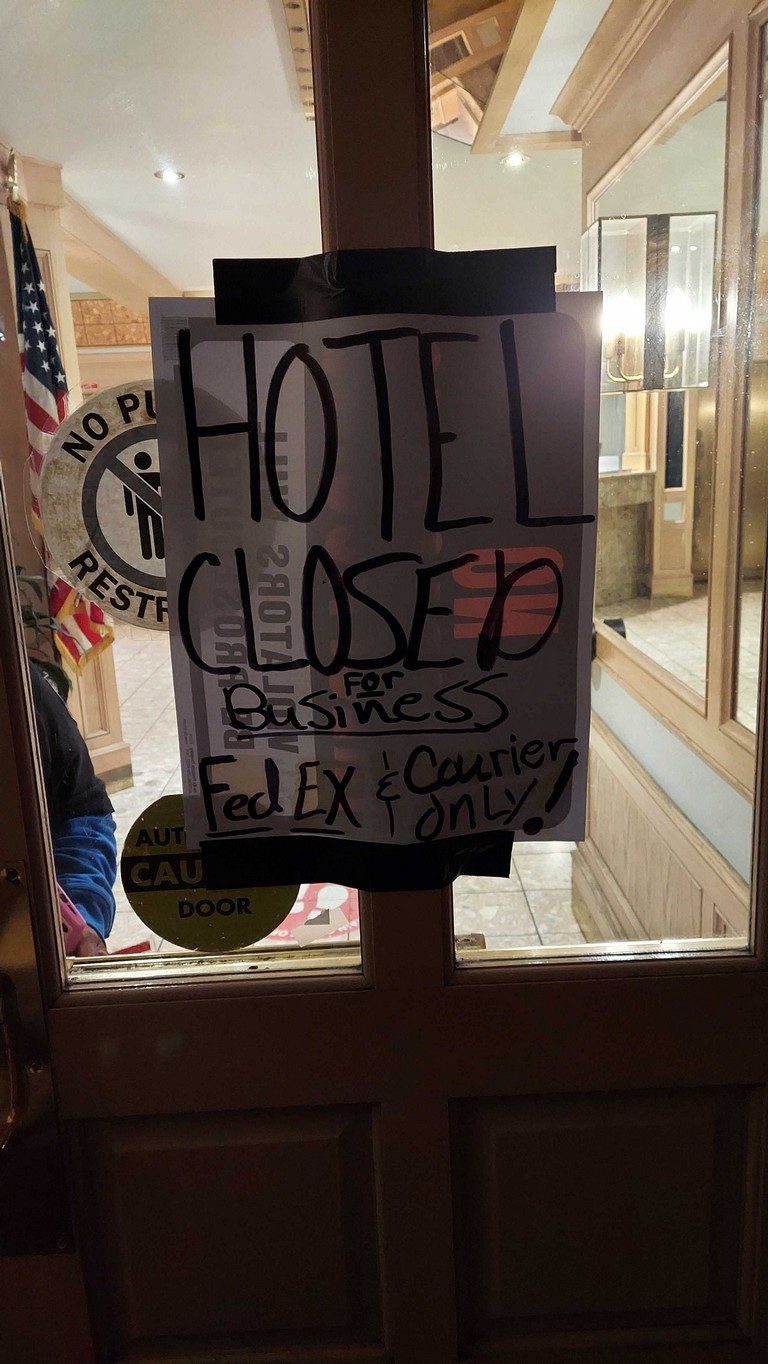 Hotel Closed for Business sign